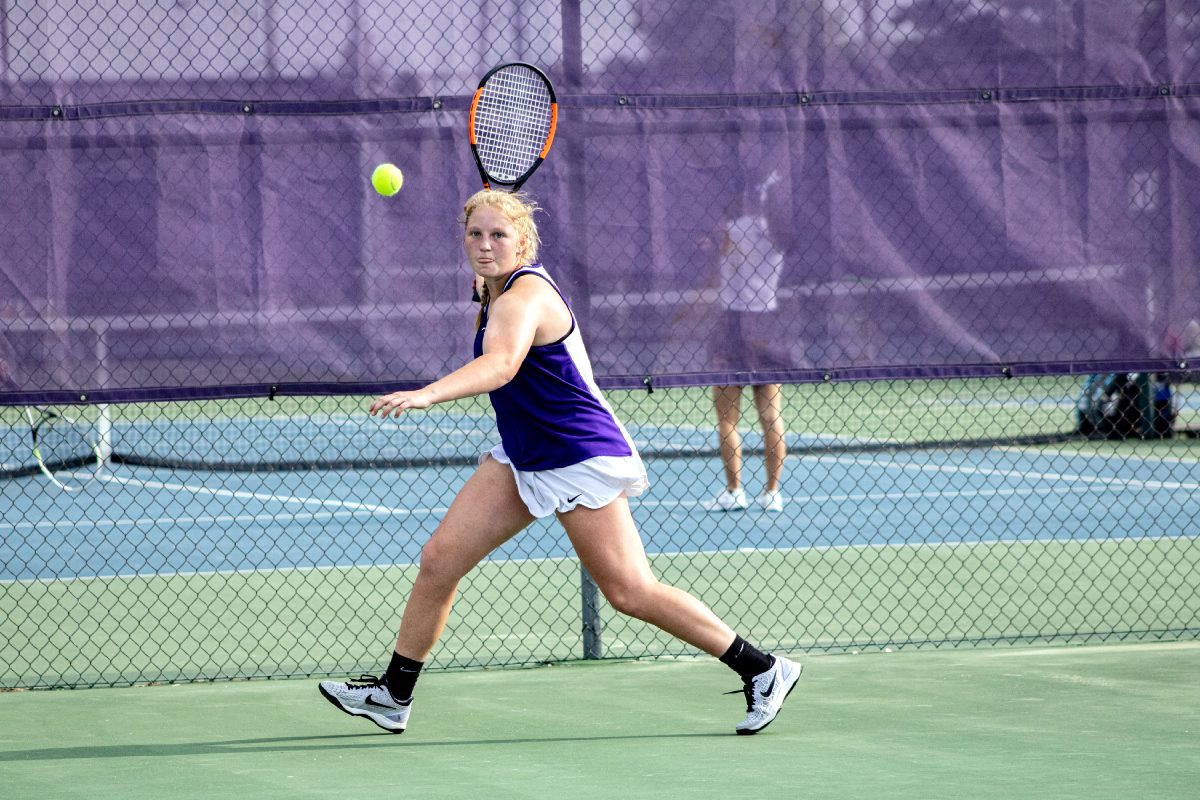 Brooke Schafstall returns a shot with her forehand against Columbus North at Bloomington South in the regional championship.  Ethan Levy