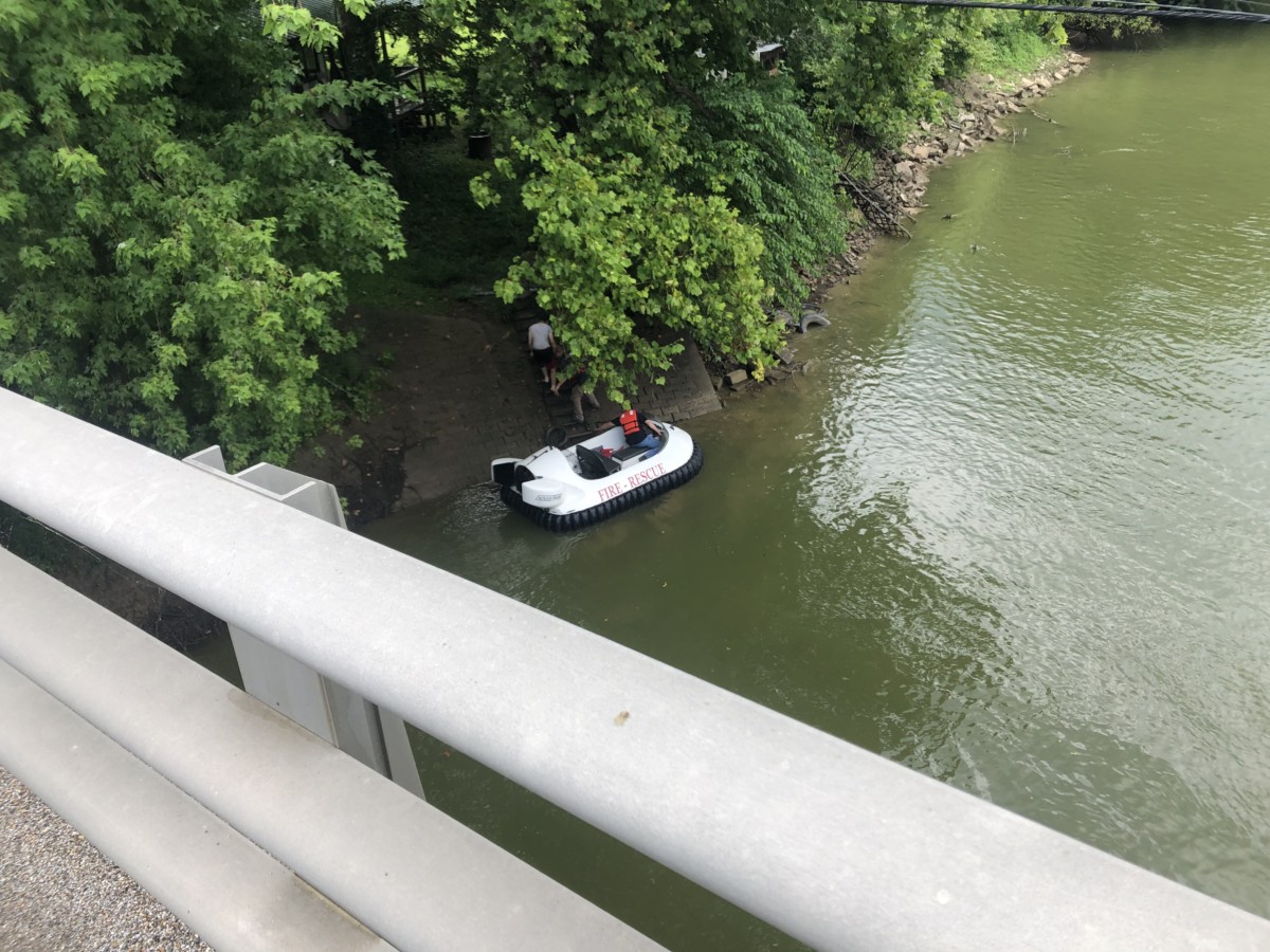 A local youth rescued Tuesday afternoon from the East Fort White River north of the Slab Road bridge walks walks 