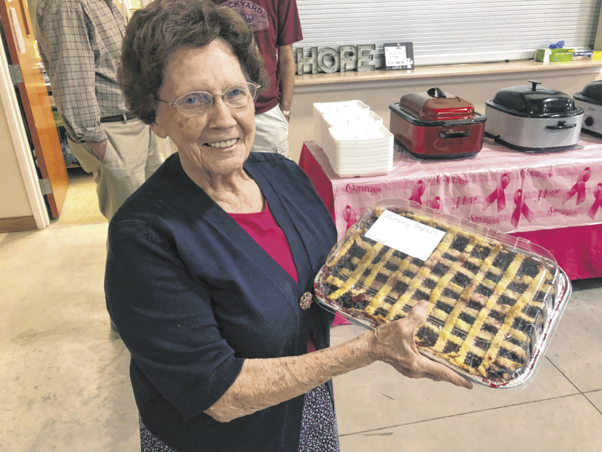 Coleen Gray of Medora donated her famous blackberry cobbler for the sixth annual HOPE Medora Goes Pink dessert auction Saturday at Medora Christian Church.