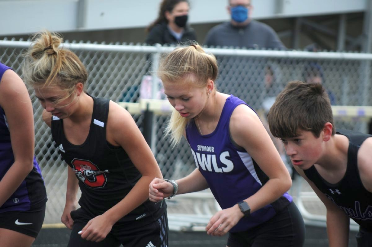 Brooke Trinkle gets set to run the 1600 on Tuesday night against Madison. Trinkle placed first with a time of 5:27.  By Dylan Wallace | The Tribune dwallace@stagingtb.aimmediallcindiana.com