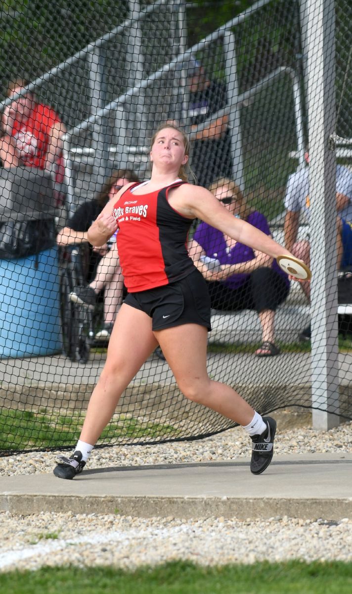 Brownstown Central’s Avery Koch throws the discus at regional at Bloomington North. Koch won with a throw of 135’3” and qualified for state. Jeff Lubker