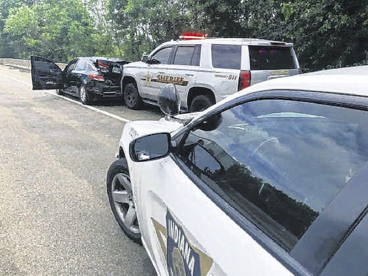 Two Nashville, Tennessee, women were arrested Wednesday at the end of 42-mile pursuit on Interstate 65 that started with the report of a theft from a store at an outlet mall near Taylorsville and ended with this crash involving an officer with the Jackson County Sheriff's Department near Austin.  Indiana State Police photo